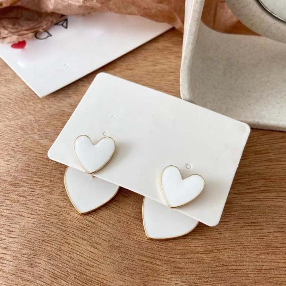 White Heart Shaped Studs